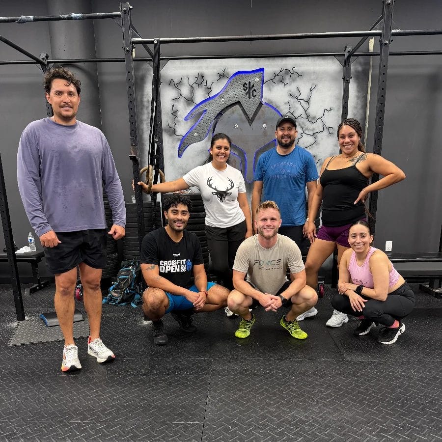Group of members posing together after a CrossFit-style training session at Showdown Training Club